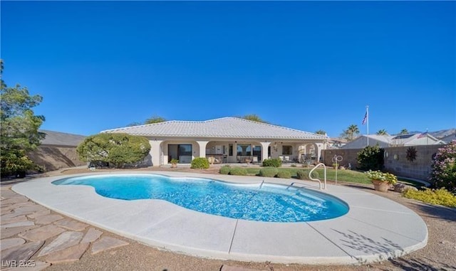 view of pool featuring a patio