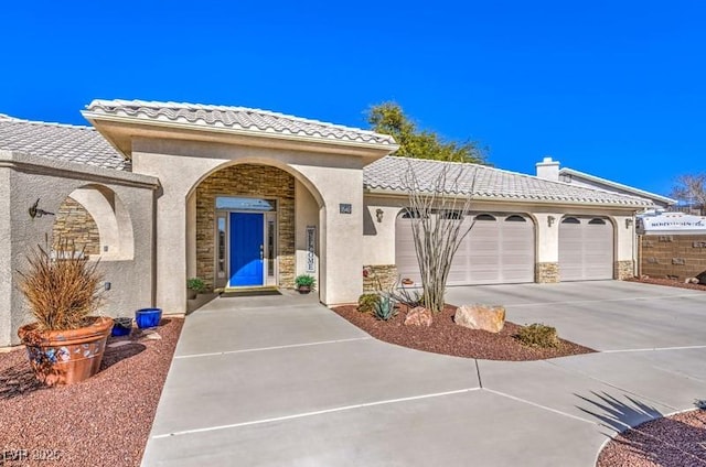 view of front of property featuring a garage