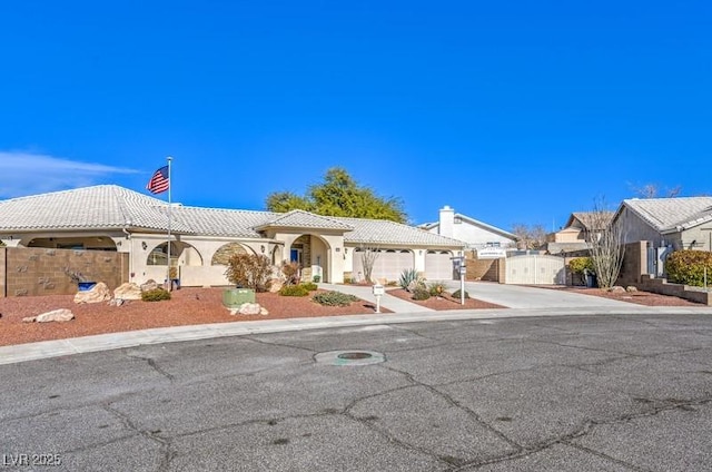 view of front of property featuring a garage