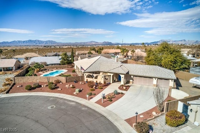 drone / aerial view featuring a mountain view