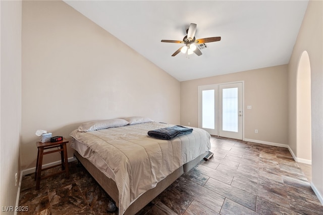 bedroom featuring lofted ceiling, access to exterior, and ceiling fan