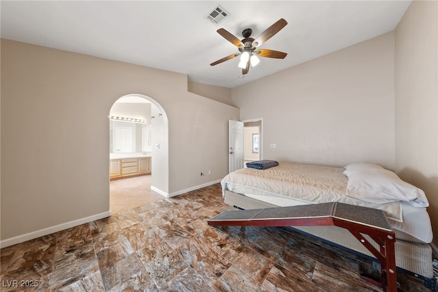 bedroom featuring ceiling fan and connected bathroom