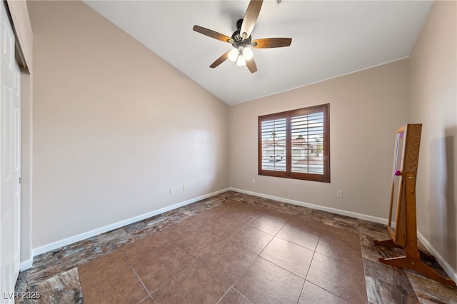 unfurnished room with vaulted ceiling and ceiling fan