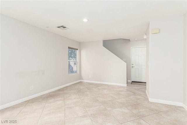 view of tiled spare room