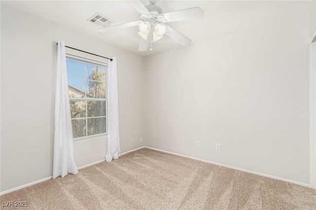 unfurnished room with light carpet and ceiling fan