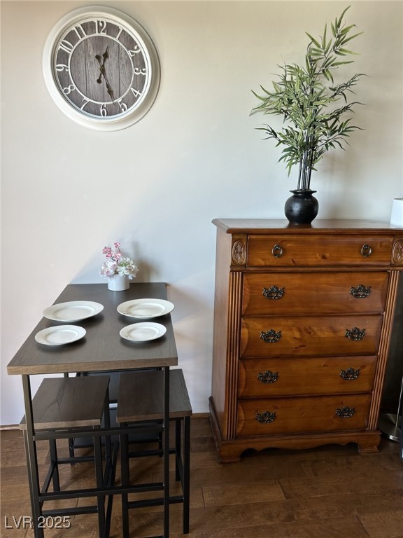 dining space featuring dark hardwood / wood-style flooring