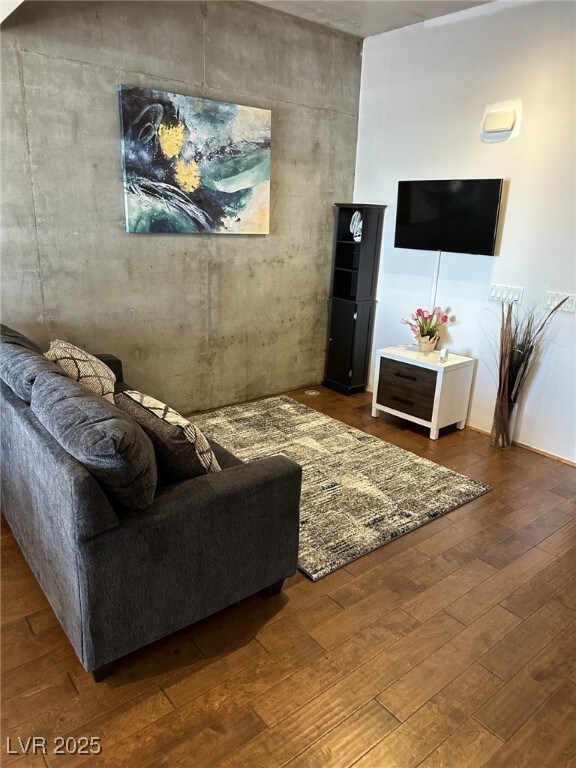 living room featuring dark hardwood / wood-style flooring