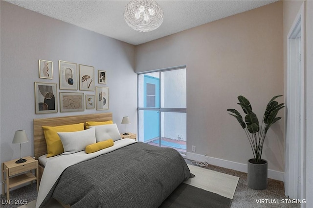 carpeted bedroom with a textured ceiling