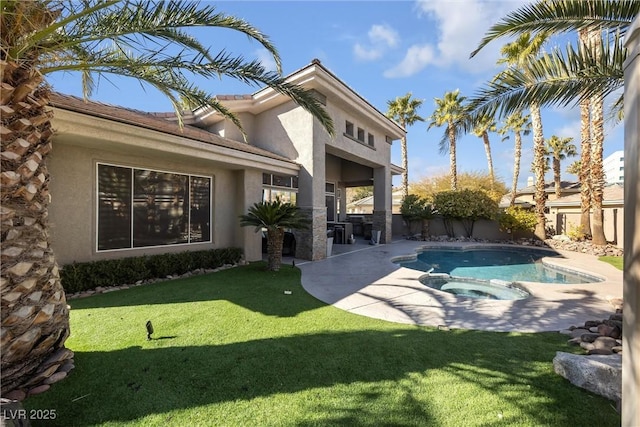 520 Summer Mesa Dr, Las Vegas, NV 89144 - back of property with a yard, stucco siding, a fenced backyard, and a patio
