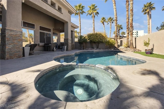520 Summer Mesa Dr, Las Vegas, NV 89144 - view of swimming pool with a patio, a pool with connected hot tub, and a fenced backyard