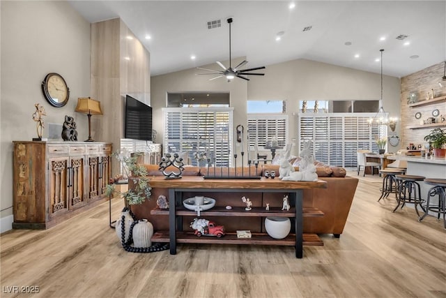 520 Summer Mesa Dr, Las Vegas, NV 89144 - living area with vaulted ceiling, ceiling fan, visible vents, and light wood-style floors