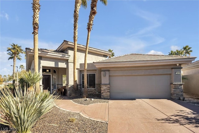 520 Summer Mesa Dr, Las Vegas, NV 89144 - prairie-style house featuring driveway, stucco siding, an attached garage, and stone siding