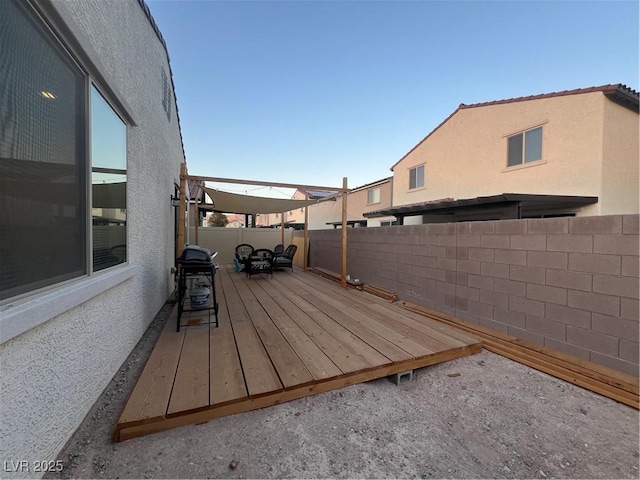 wooden deck with area for grilling