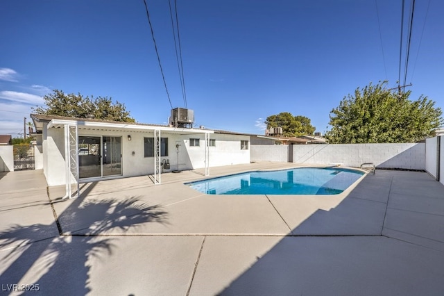 view of swimming pool with a fenced backyard, central air condition unit, a fenced in pool, and a patio