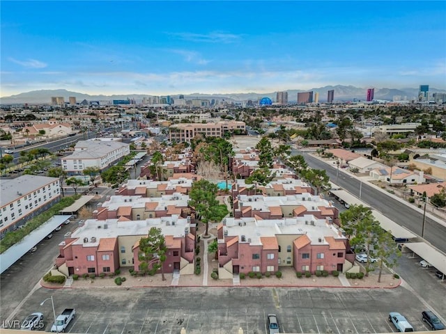 birds eye view of property featuring a mountain view