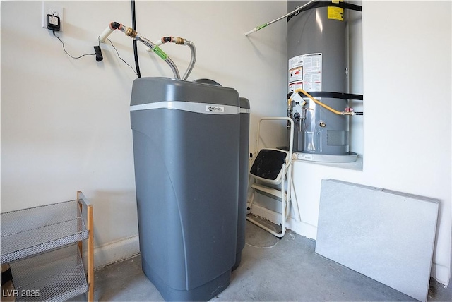 utility room with strapped water heater