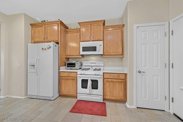 kitchen featuring white appliances