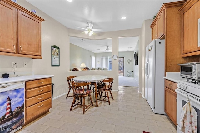 kitchen featuring ceiling fan, wine cooler, and white appliances