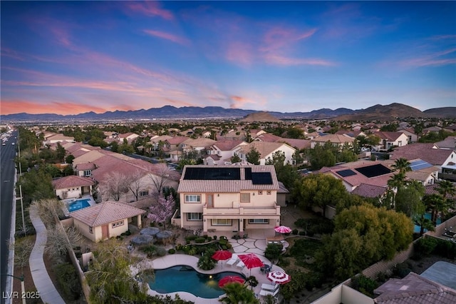 aerial view at dusk with a mountain view