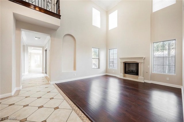 unfurnished living room featuring light hardwood / wood-style flooring