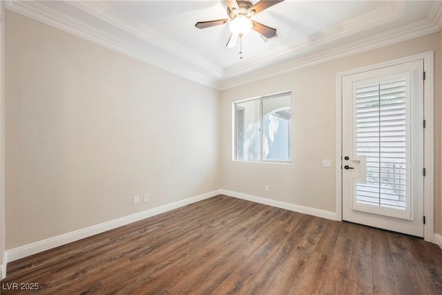 unfurnished room with ceiling fan, ornamental molding, plenty of natural light, and dark hardwood / wood-style floors