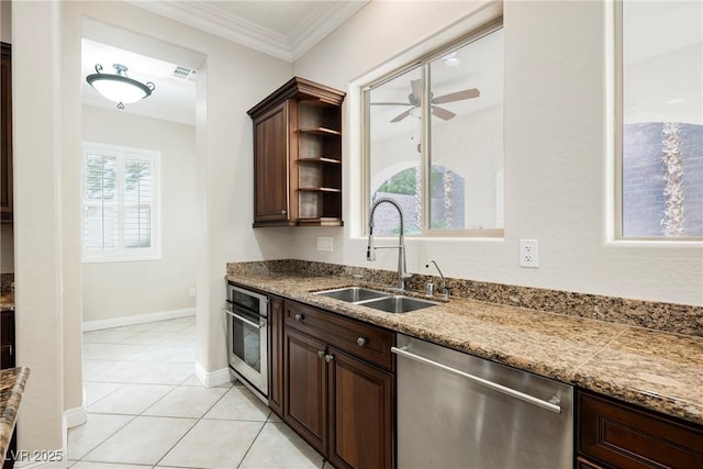 kitchen with sink, ceiling fan, dark brown cabinets, stainless steel appliances, and ornamental molding