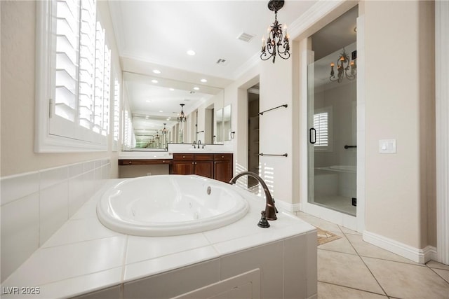 bathroom with shower with separate bathtub, a chandelier, vanity, crown molding, and tile patterned floors