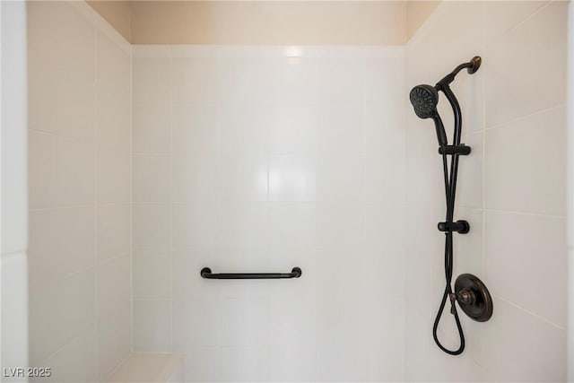 details featuring a tile shower