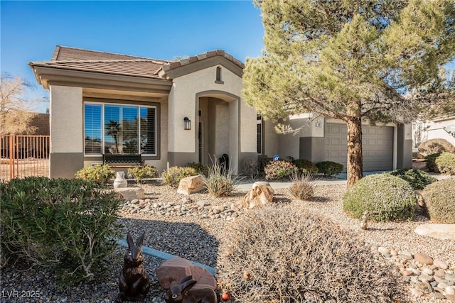 view of front of home with a garage