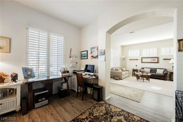 office space with hardwood / wood-style floors