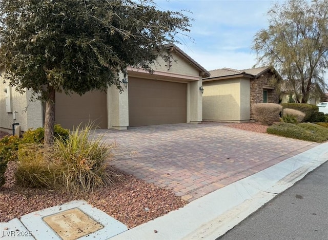 view of front of home with a garage