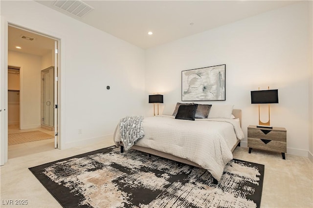 bedroom with light colored carpet