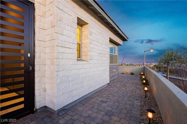 view of property exterior at dusk