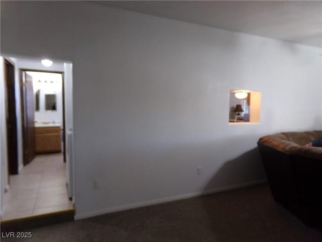 bedroom featuring baseboards