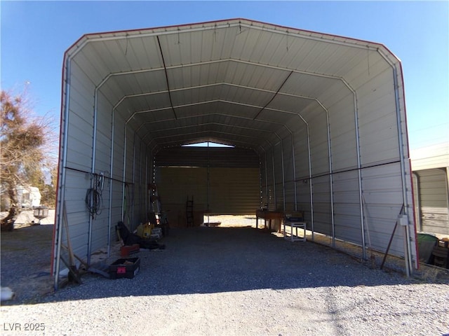 view of parking / parking lot with a detached carport