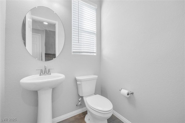 bathroom with sink and toilet