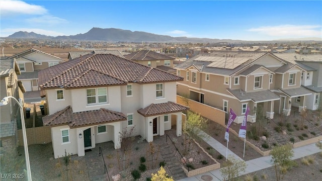 drone / aerial view featuring a mountain view