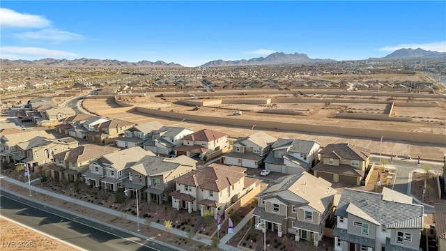 birds eye view of property featuring a mountain view