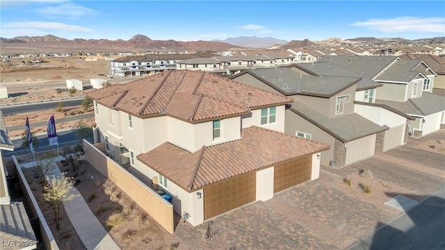 aerial view featuring a mountain view