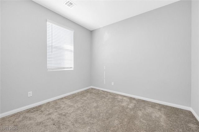 empty room with carpet flooring