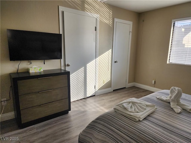 bedroom featuring light hardwood / wood-style floors