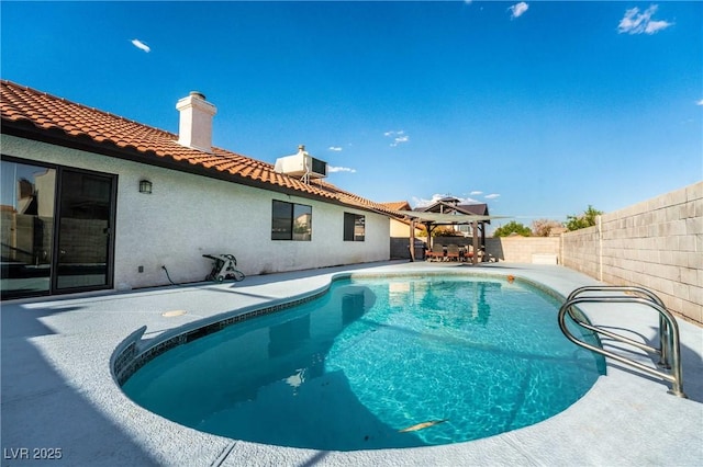 view of swimming pool featuring a gazebo and cooling unit