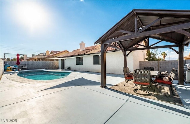 view of pool with a gazebo and a patio