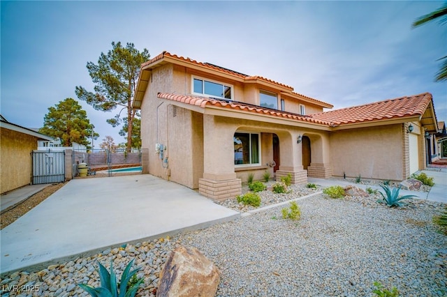 view of mediterranean / spanish-style house