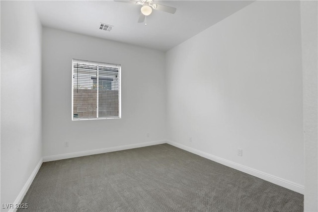 carpeted empty room with ceiling fan