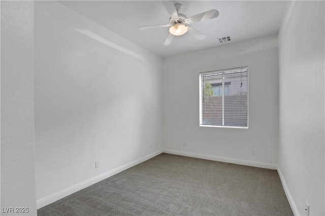 carpeted empty room with ceiling fan