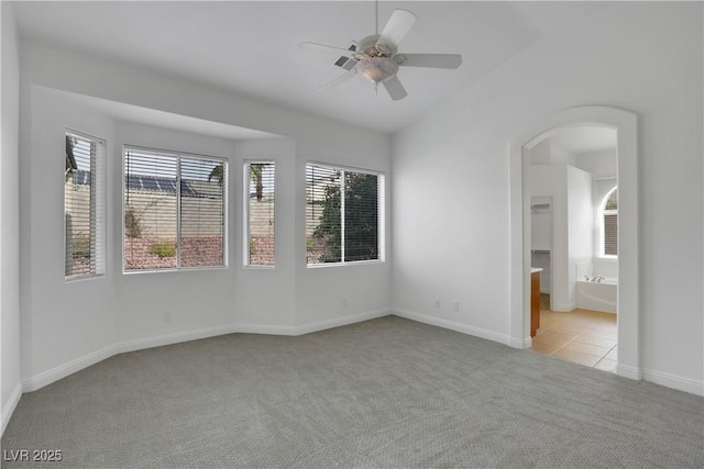 carpeted empty room with ceiling fan