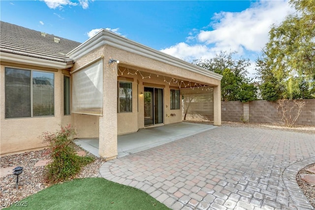 rear view of property with a patio