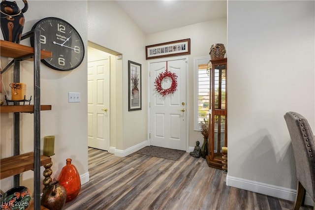 entrance foyer featuring dark hardwood / wood-style floors