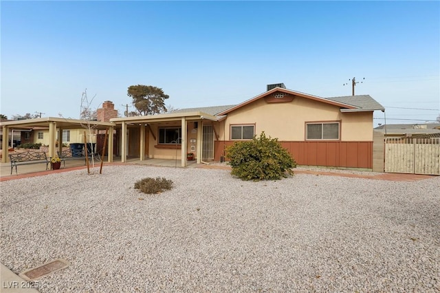 ranch-style home with a patio area